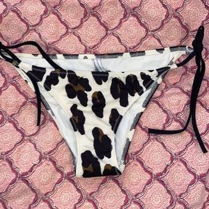 Solid & striped L animal print bikini bottoms tie side